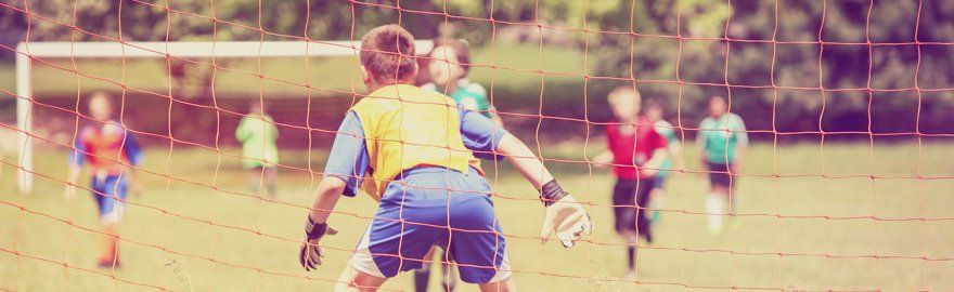 Kids playing football
