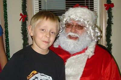 Boy with Santa Claus — Mobile Homes in Fort Wayne, IN Boy with Santa Claus — Mobile Homes in Fort Wayne, IN