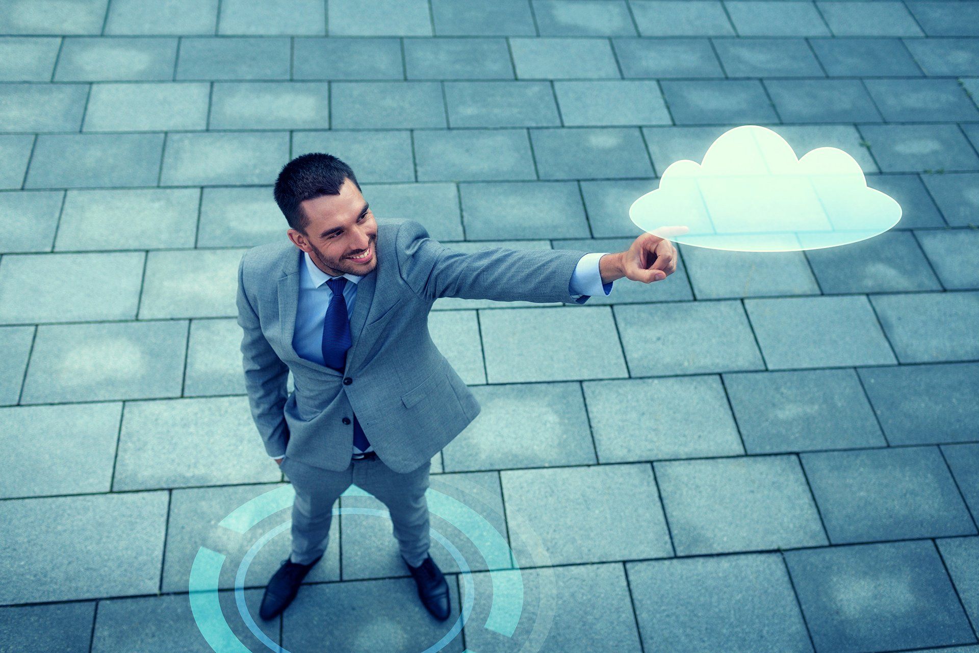 Man pointing at cloud