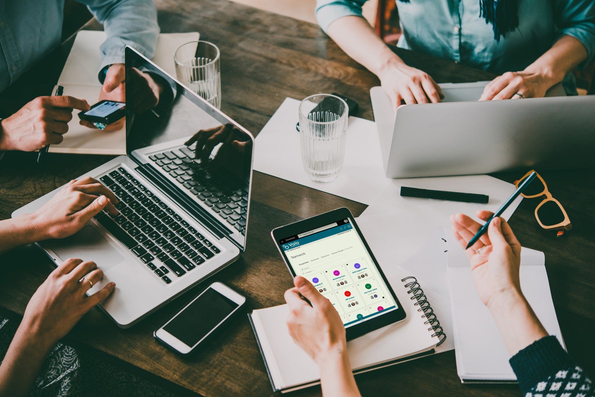 Employees collaborating at work
