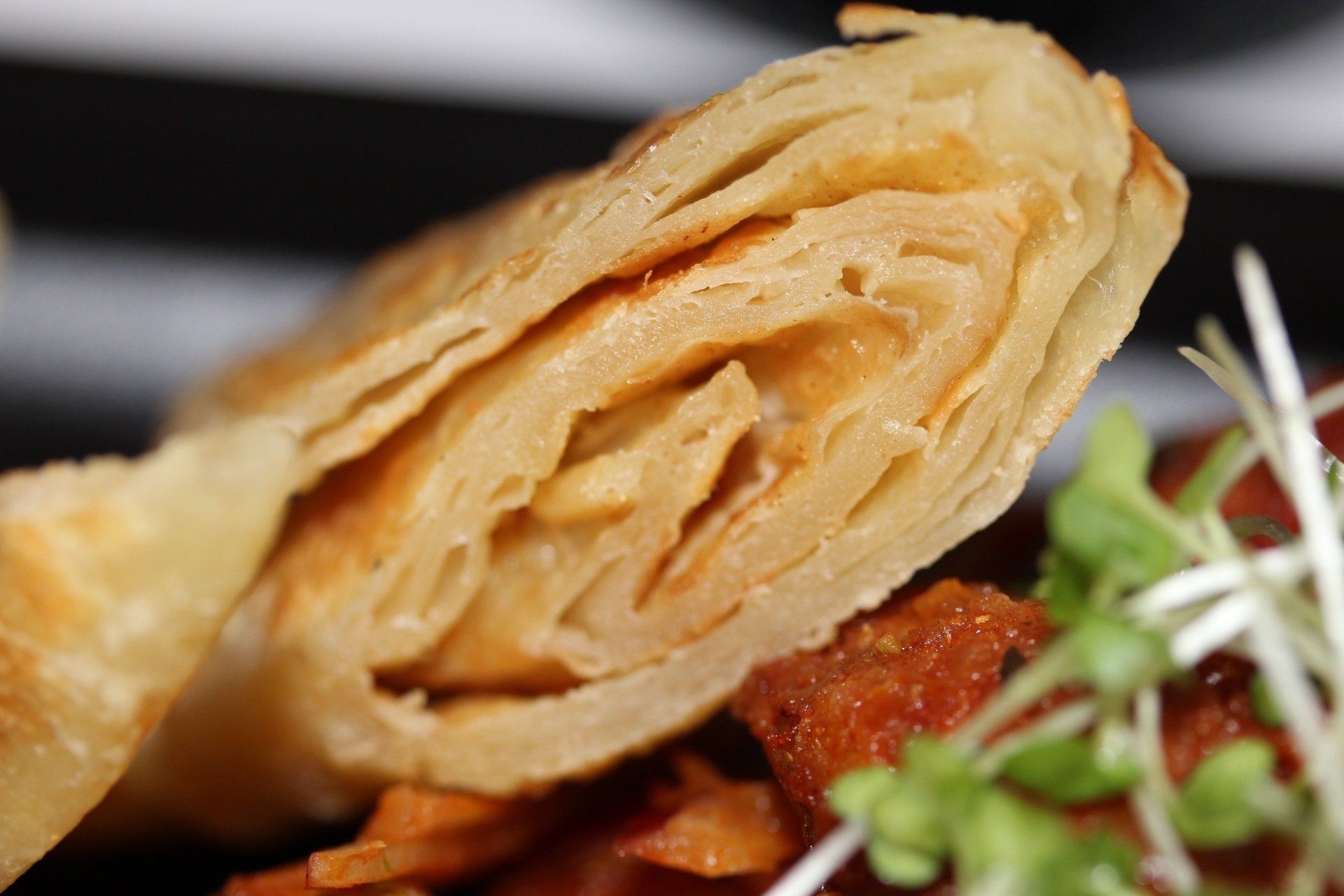 A close up of a piece of food on a plate.