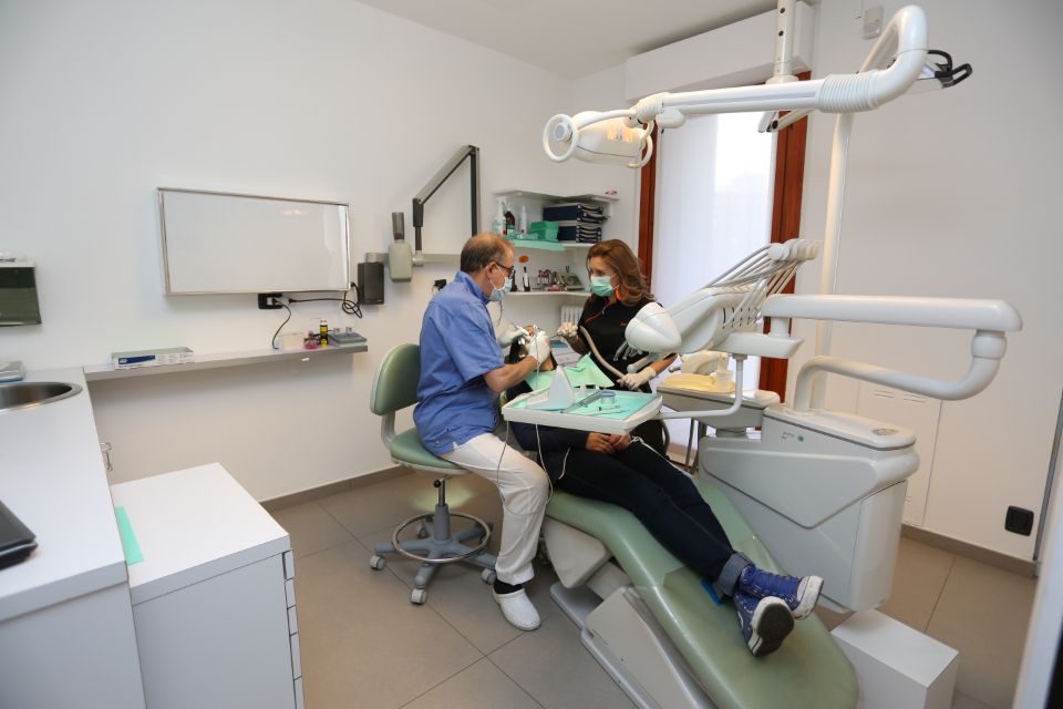 Dentista e assistente