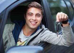 Teenager Holding Keys Teenager Holding Keys