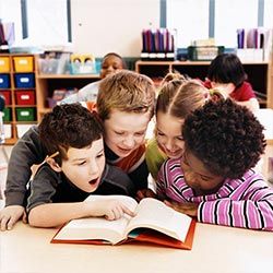 Kids Reading Book — Child Care Services in Woodridge, IL Kids Reading Book — Child Care Services in Woodridge, IL