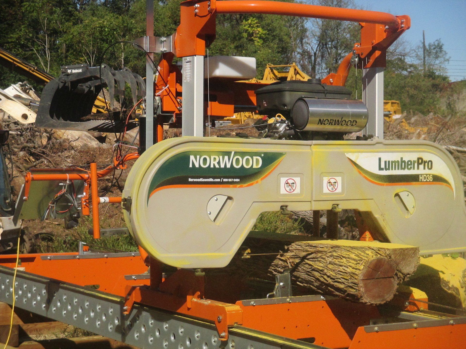 Norwood Sawmill milling mulberry slabs.
