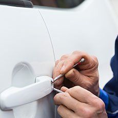 Unlocking Car Door - Locksmiths in Chicago, IL Unlocking Car Door - Locksmiths in Chicago, IL