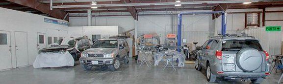 Cars in the garage — Saint Charles, MO — Rick's Auto Body