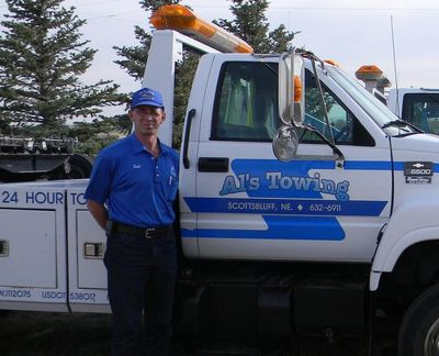 Todd standing by company truck