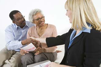 Couple receiving financial services in Durham, NC Couple receiving financial services in Durham, NC