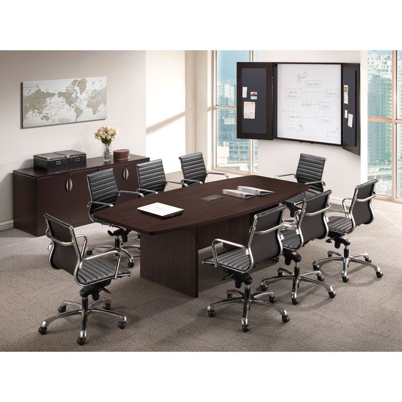 Conference room with dark wood table, chairs, and cabinet. A world map and bulletin board are on the wall.