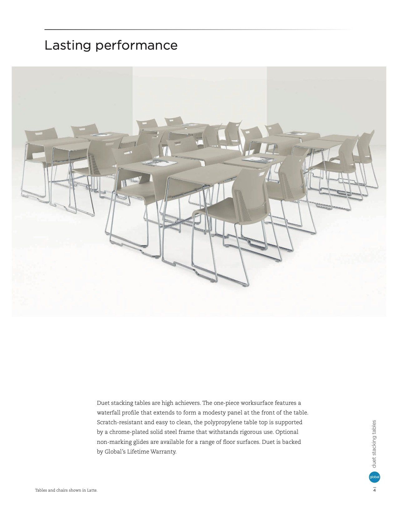 Classroom with desks and chairs arranged neatly.