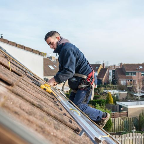Repairing the roof - roofing, roofers, roofing contractors, re-roofing, residential roofing, commercial roofing, new roof in Riveerside CA
