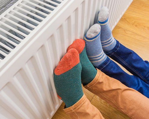 Electric Heater At Home — Moline, IL — Erickson Plumbing & Heating Electric Heater At Home — Moline, IL — Erickson Plumbing & Heating