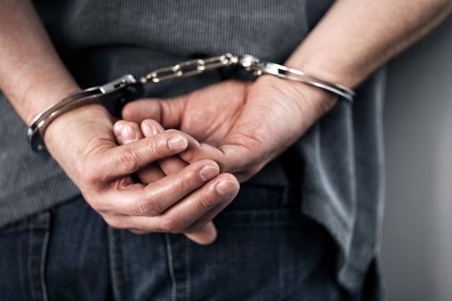 Handcuffed Hands — Fresno, CA — Law Office of Ralph Torres Handcuffed Hands — Fresno, CA — Law Office of Ralph Torres