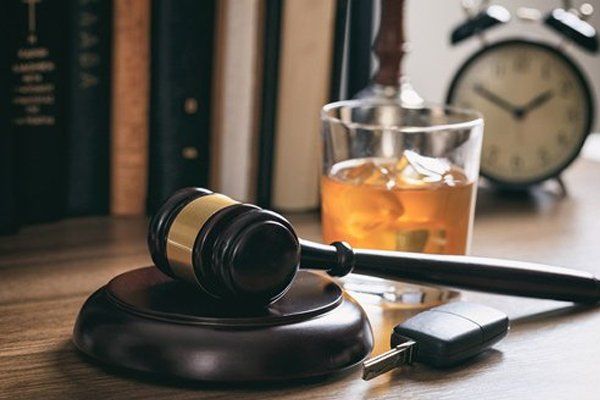 Gavel, Alcohol And Car Key — Fresno, CA — Law Office of Ralph Torres Gavel, Alcohol And Car Key — Fresno, CA — Law Office of Ralph Torres