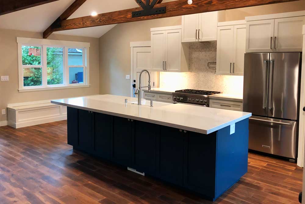 Open kitchen remodeling design with white custom cabinets