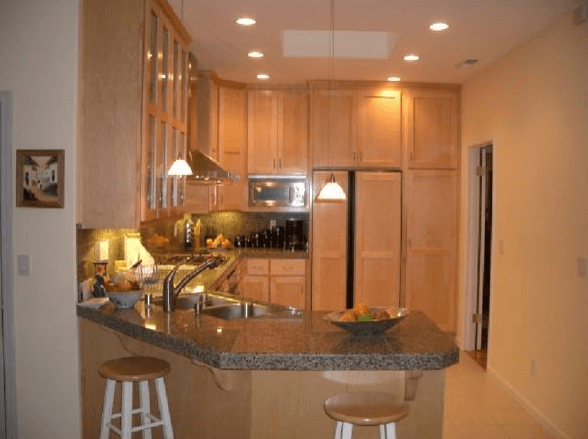 Full kitchen remodeling project with custom cabinets and built-in pantry