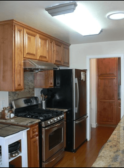 Reverse view of galley style kitchen remodeling  design in Santa Clara, CA