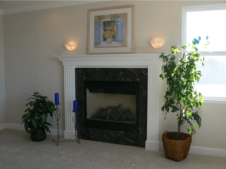 Custom stone fire place and mantel in Santa Clara, CA