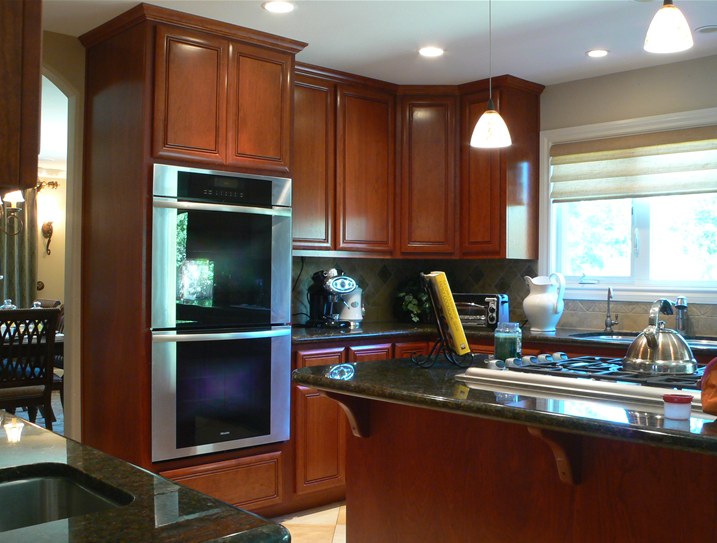 Kitchen remodel with built-in oven and custom cabinets