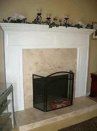 decorations next to the fireplace mantel