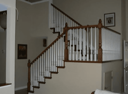 winding stairs with brown posts