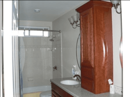 Cherry wood custom cabinets for a bathroom vanity in Santa Clara, CA