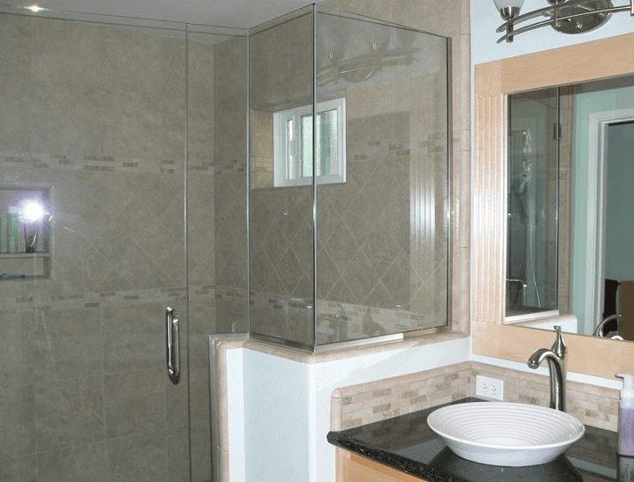 Custom stone and tile work for a walk-in shower enclosure in Santa Clara, CA