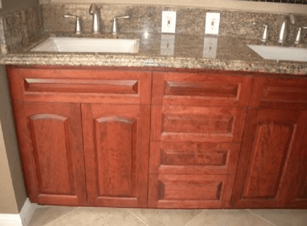 Close up of cherry wood custom cabinets for a bathroom vanity in Santa Clara, CA