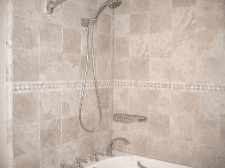 Interior of a shower enclosure with custom stone walls