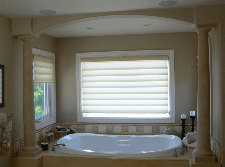Custom stone column and tile work for a unique quartz bathtub in Santa Clara, CA