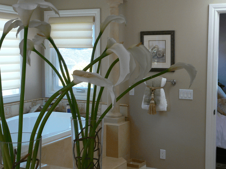 Close up of lillies in a newly remodeled bathroom