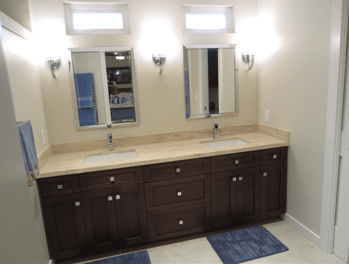One piece, dual sink bathroom vanity with custom cabinets