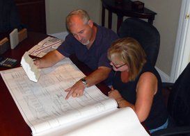 Looking over design plans