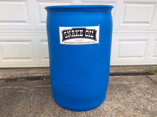 A blue barrel with snake oil written on it