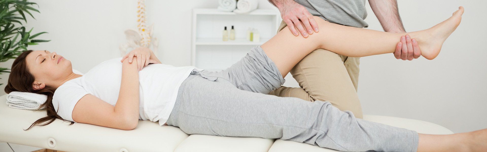 peaceful brunette woman lying on a medical table macquarie osteopaths peaceful brunette woman lying on a medical table