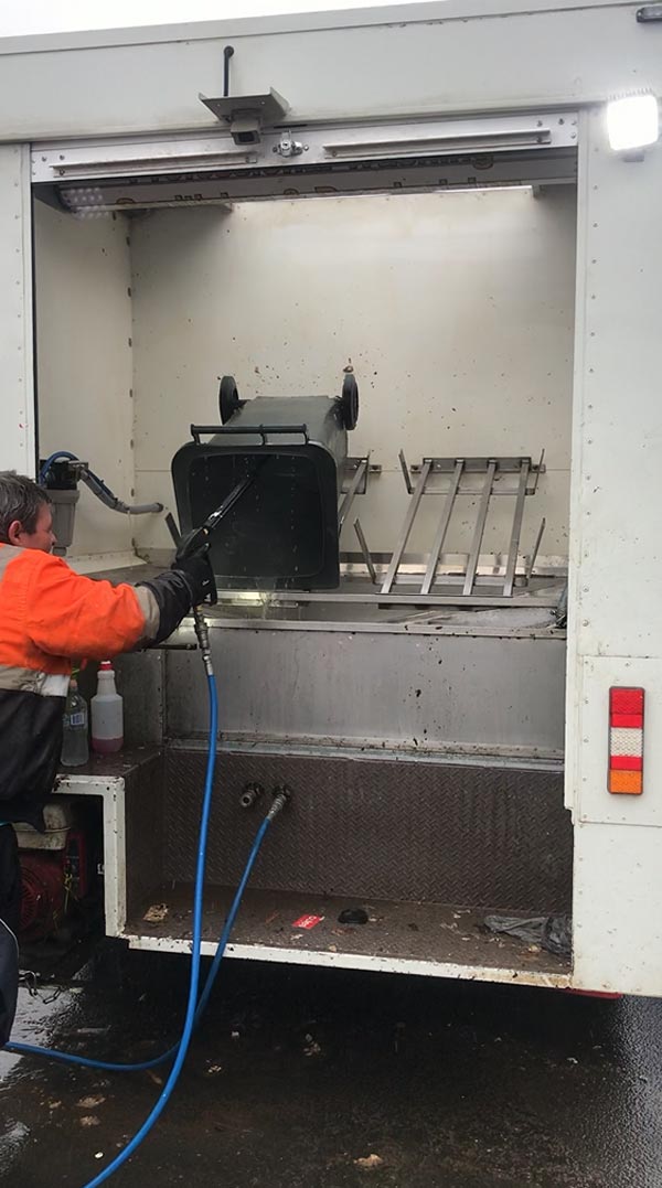 bin being cleaned