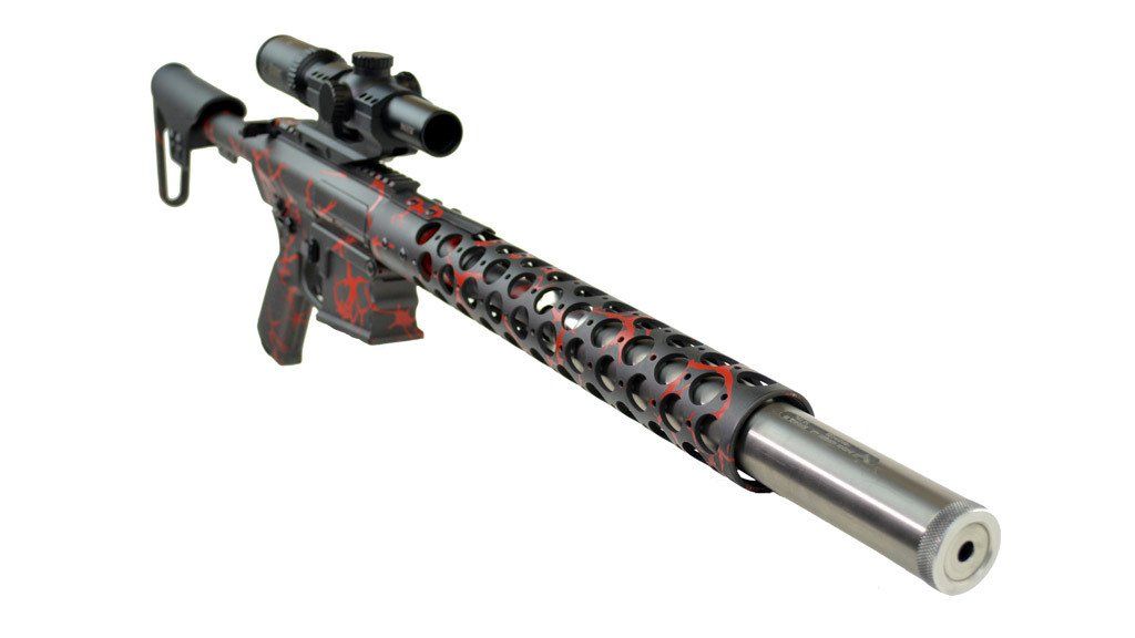 Black and red rifle with scope and suppressor against a white background.