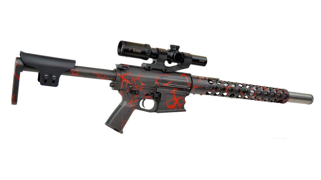 Black and red AR-15 rifle with scope and patterned handguard.