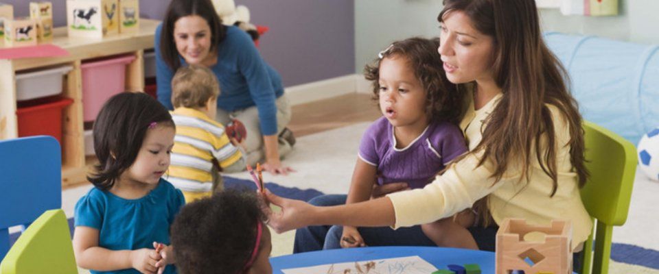 Children with their teachers