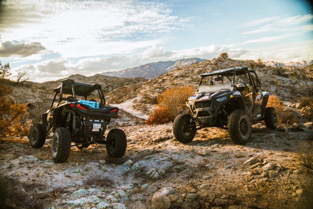 Man driving Polaris RZR on off-road trail in Tucson AZ