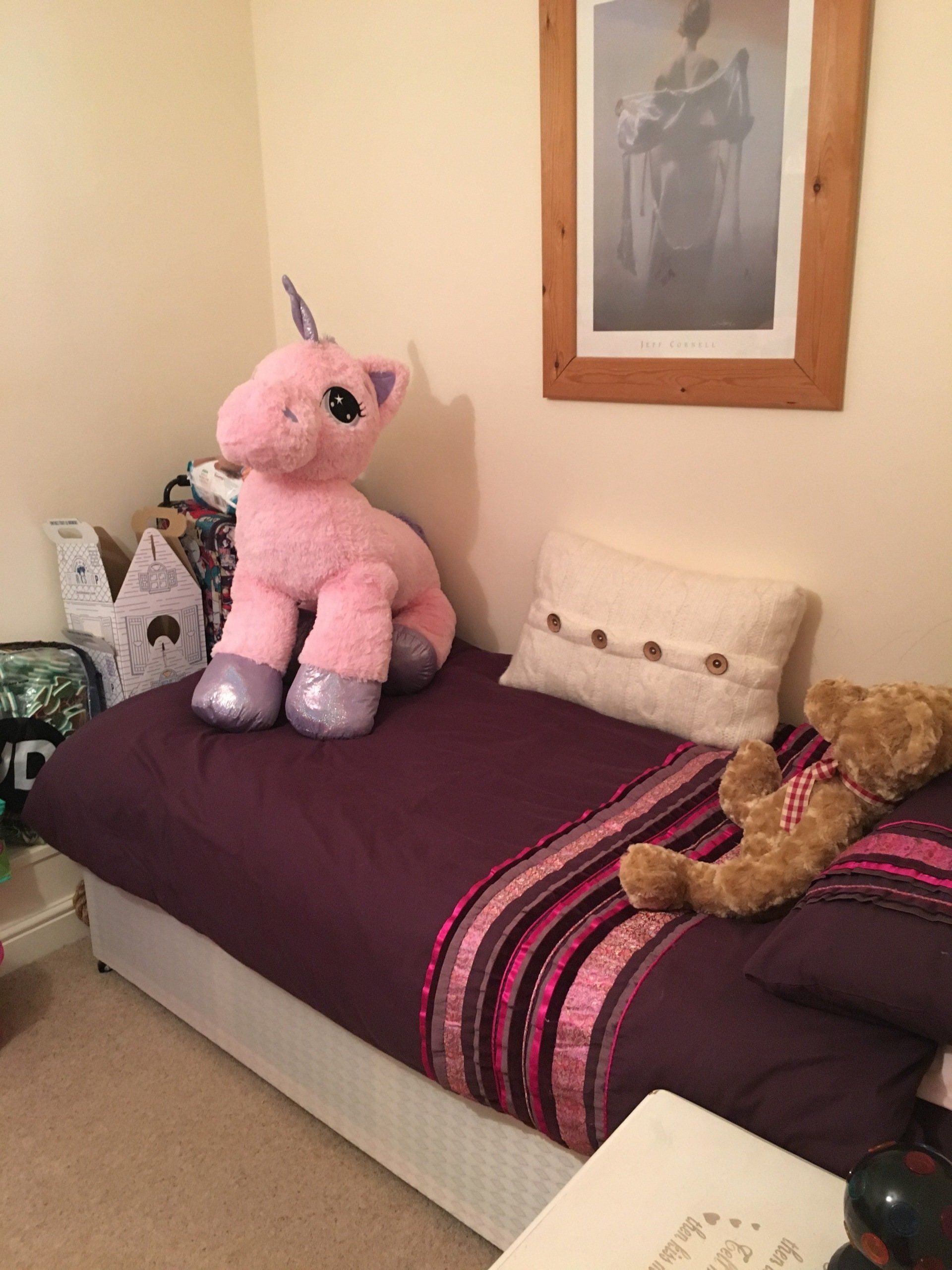 Child's bedroom with toys kept in boxes