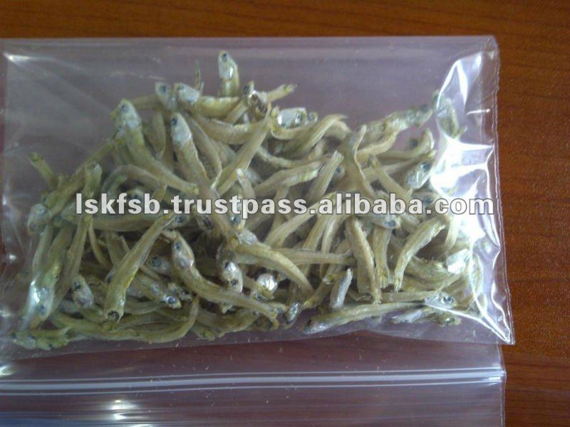 Dried anchovies in a clear plastic bag, ready for sale.