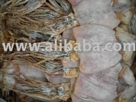Dried squid pieces, light purple and tan, piled together.