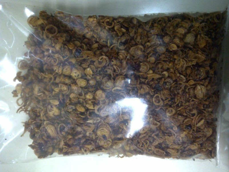 Bag of dried, fried shallots; brown and crispy in a clear plastic package.