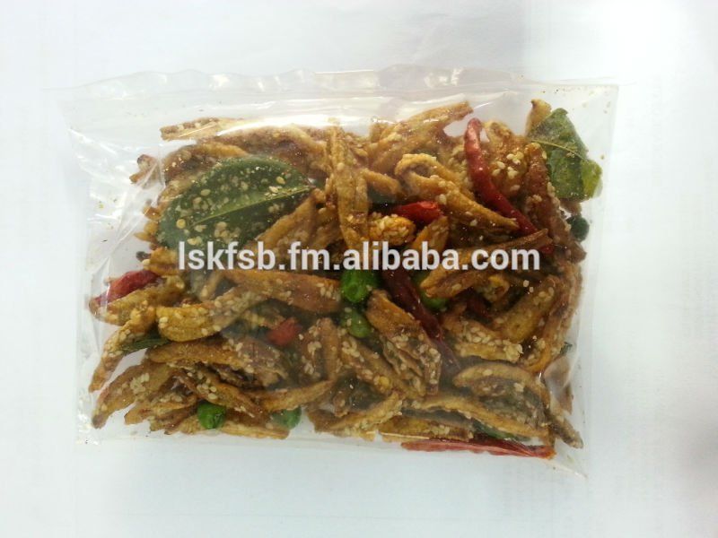 Bag of seasoned, fried anchovies with chili and lime leaves.