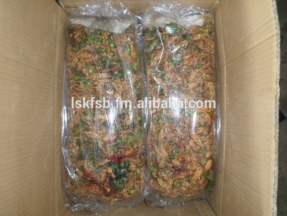 Two plastic bags of dried, mixed ingredients inside a cardboard box.