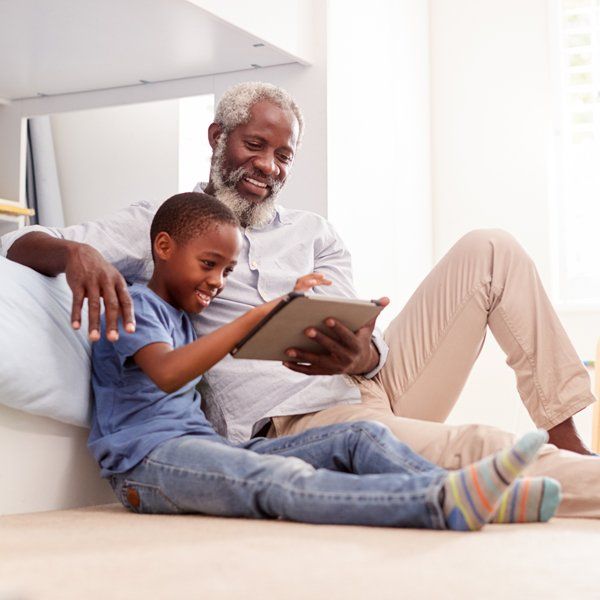 Grandfather Playing With His Grandson — Woodland, CA — Jack Cramer Insurance Grandfather Playing With His Grandson — Woodland, CA — Jack Cramer Insurance