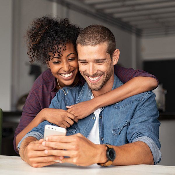 Smiling Couple — Woodland, CA — Jack Cramer Insurance Smiling Couple — Woodland, CA — Jack Cramer Insurance