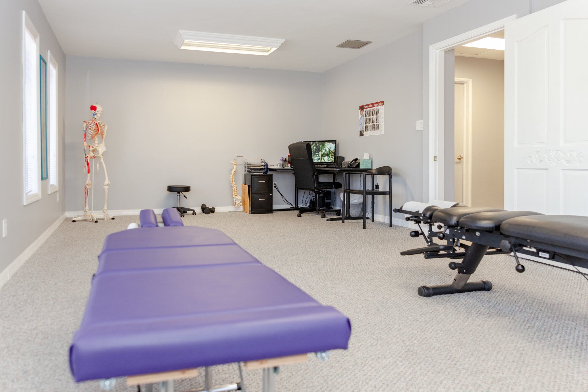 There is a purple table in the middle of the room.